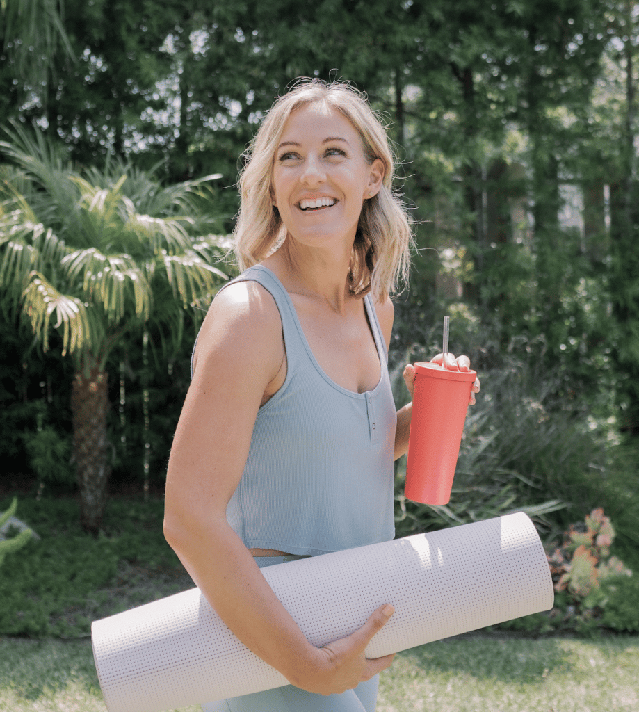 Robin Long with Pilates mat